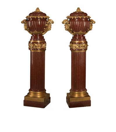 A Pair of French Napoleon III Gilt Bronze Mounted Covered Urns on Fluted Rouge Marble Columns, 19th century  